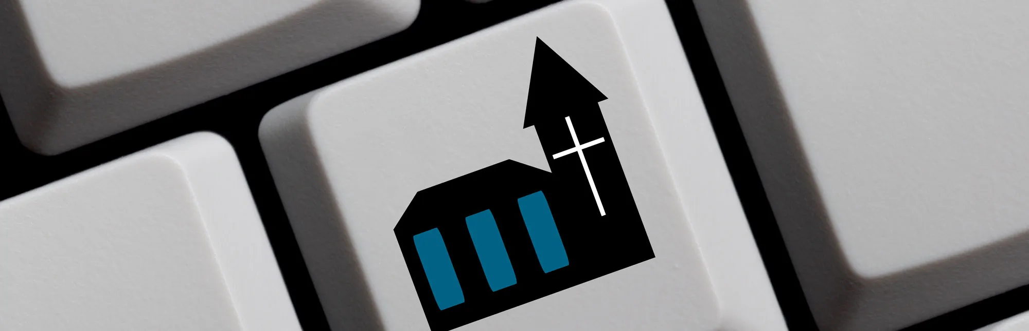 Quelle: kebox – stock.adobe.com Computer-Tastatur-Taste mit einem Kirchensymbol